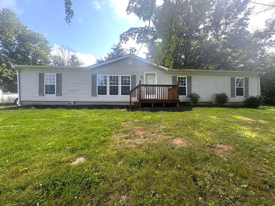 Home on 4.30 acres with shop & pond